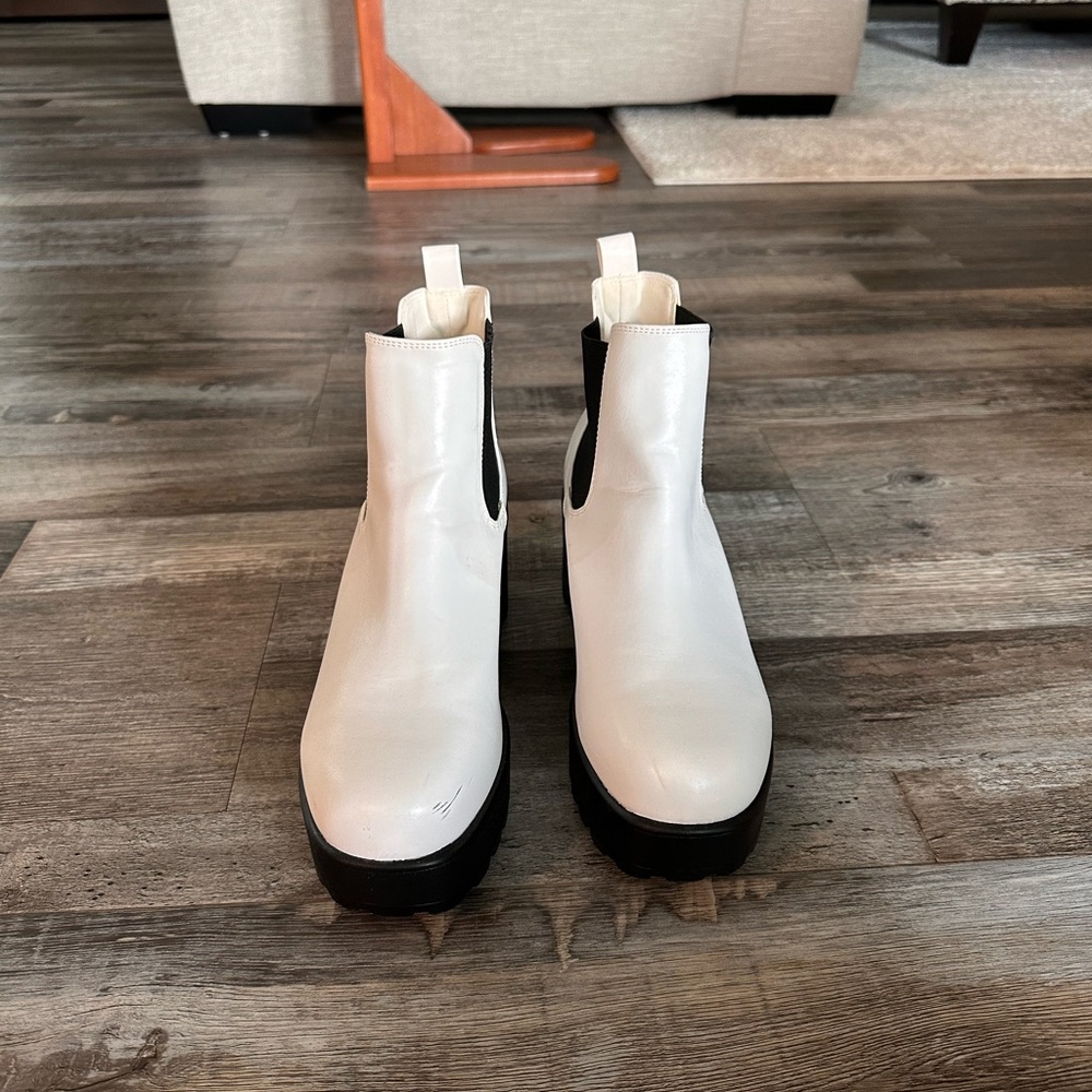 White and black booties, size 8.5 us.